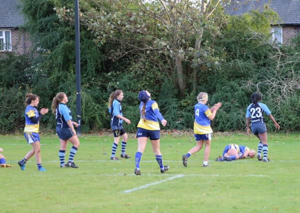 The Chi uni rugby team on the attack against Sussex Uni
