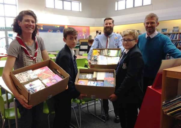 The 1st South Bersted Air Scouts Group was delighted to accept the donation of books from Felpham Community College