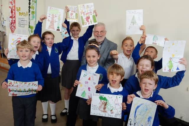 John Griffin, vice-chairman of Billingshurst Community Partnership, with the ten poster competition winners