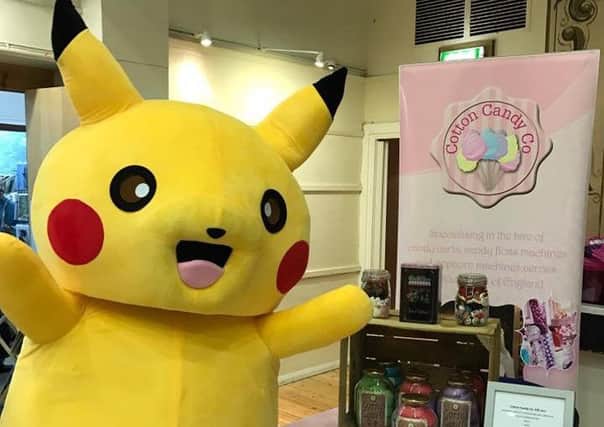 Pikachu welcomes visitors to Battle Christmas Market SUS-161116-100310001