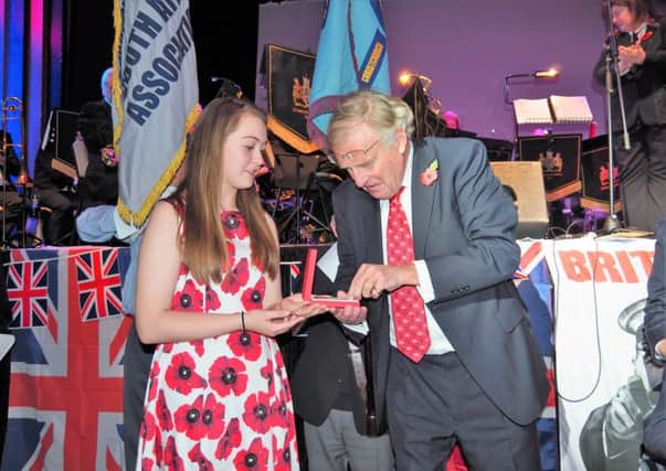 Lydia Palmer and the Member of Parliament for Christchurch, Mr Christopher Chope with the Legion D'Honneur