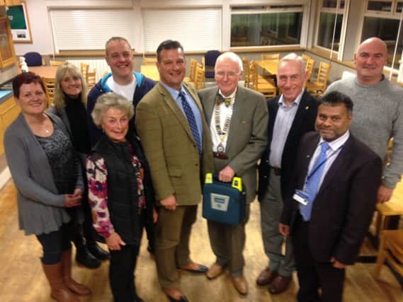 Presentation to Eastbourne Rugby Club from members of the Rotary Club of Eastbourne SUS-161116-144356001