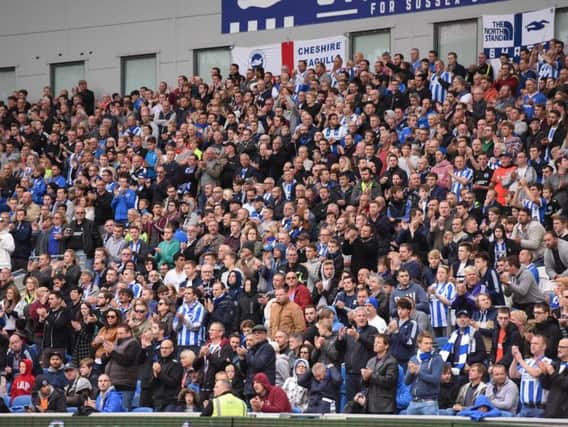 Albion fans watch on at the Amex.
