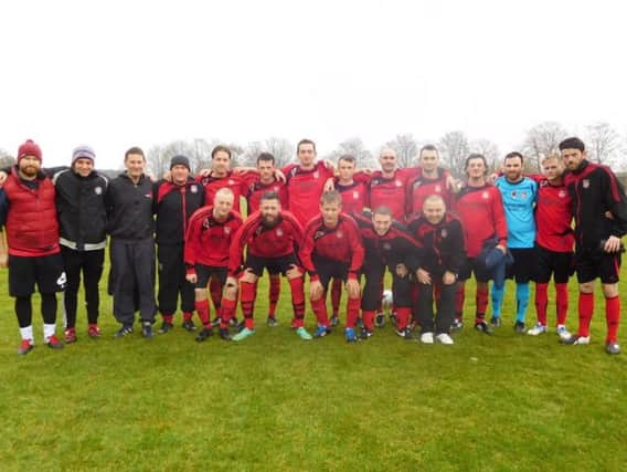 Rye Town's footballers remember the fallen in their Remembrance weekend Poppy shirts.