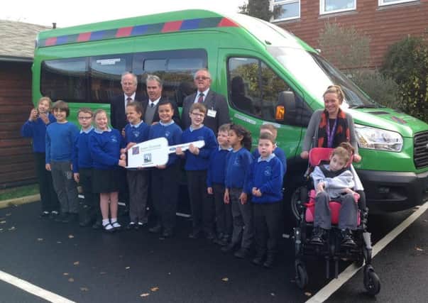 Staff and pupils at South Downs Community Special School, Eastbourne, have been presented with a new Lords Taverners wheelchair accessible minibus SUS-161117-155551001
