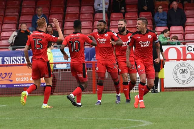 Crawley Town players celebrate Joe McNerney's equaliser during their 1-1 draw with Barnet. Picture by Phil Westlake SUS-160820-235453002