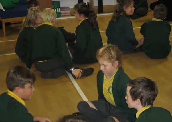 Pupils taking part in the assembly