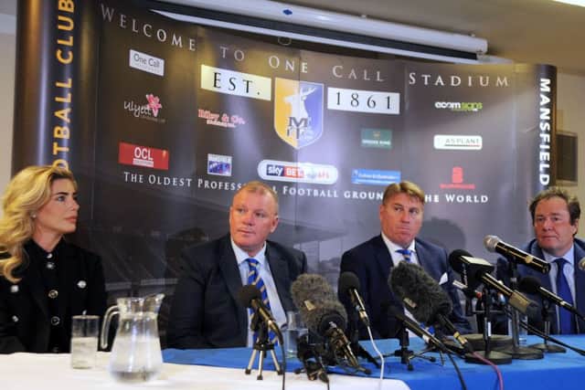 New Mansfield Town manager, Steve Evans at a press conference at the One Call Stadium on Wednesday, flanked by Caroline Radford, assistant manager Paul Raynor and Chairman John Radford. NNN-161116-180842002