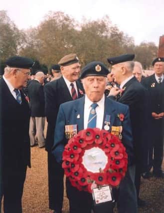 Bill Avis carrying the Suez Veterans Association wreath