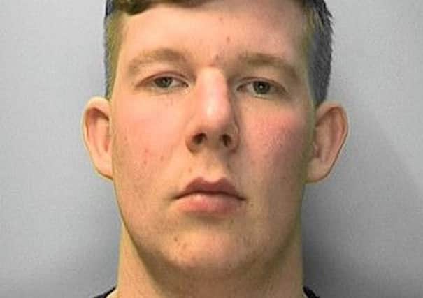 Grant Searle is wanting on recall to prison. Photo courtesy of Sussex Police. SUS-161118-145426001
