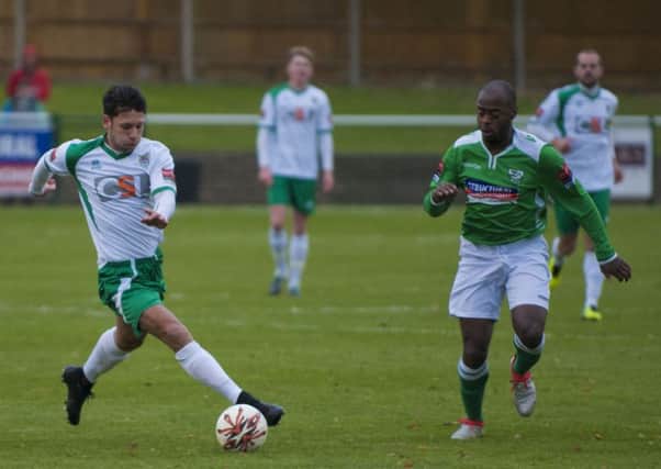 Alex Parsons gets Leatherhead on the run - he was one of the scorers in Bognor's 3-1 win / Picture by Tommy McMillan