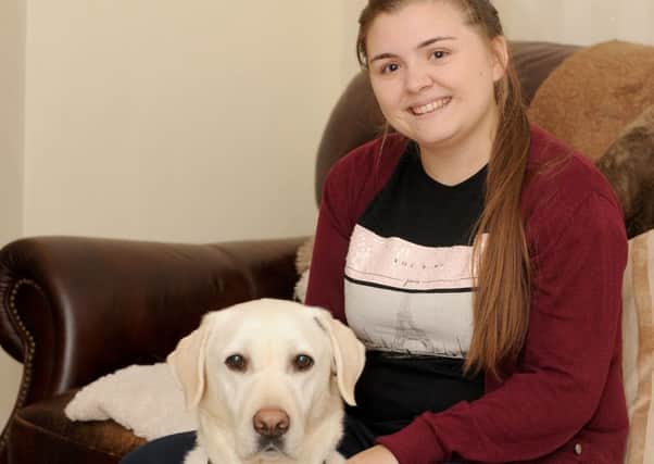 27/9/2016 (RS) real life

Danielle Thomas (23) from Cosham, suffered significant and overnight sight loss and applied for a Guide Dog called Neisha a Labrador. 

Pictured is: Danielle Thomas with her 5 year old Labrador Neisha.

Picture: Sarah Standing (161286-7304) PPP-160930-140233001