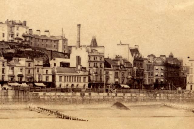 This picture, dating from the 1860s, 1870s shows major construction work on the seafront and this may be the new town drainage system that had been started at Rock-a-Nore in September 1856 and by October 1866 work had commenced on the laying of a major sewage pipe running from the bottom of London Road along the seafront to Rock-a-Nore and all other sewers draining into this main pipe. The works, which cost Â£25,640, were completed in June 1868. Rocks Carriage works can be seen on the right of centre with its chimney behind the Seaside Hotel with the brewery to its left and the coastguard station on top of the cliff behind. Where was the photographer? The angle is wrong for the picture to have been taken from the pier which was built in 1872