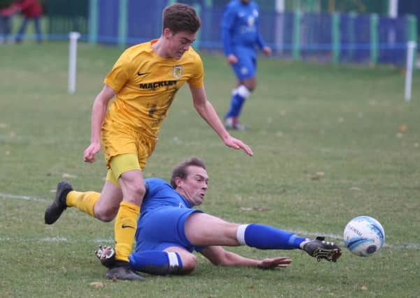 Action from Beeding's clash at Rustington on Saturday. Picture: Derek Martin DM16154675