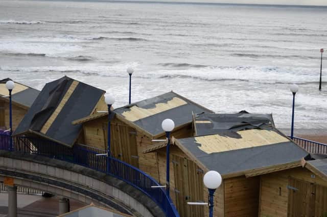 The Christmas market chalets were damaged in the storm. Photo Dan Jessup SUS-161121-112349001