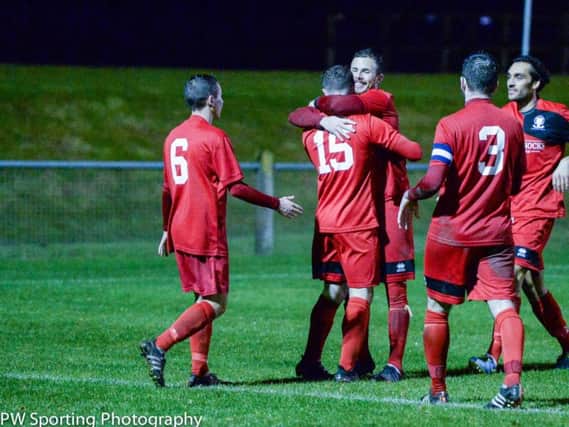 Hassocks celebrate Michael Death's second goal. Action from Hassocks v Arundel. Picture by PW Photography