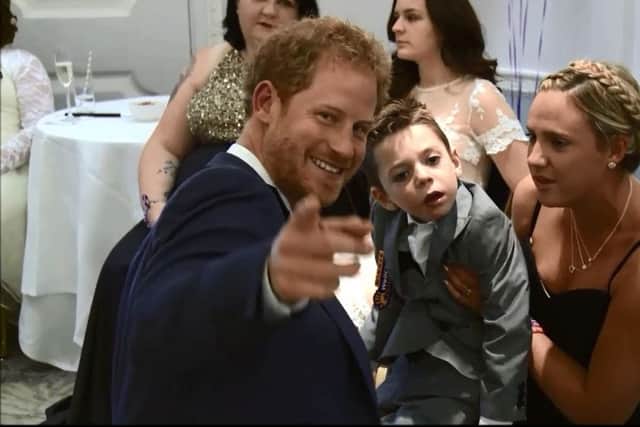 Prince Harry appearing in the WellChild 'Bad Day' music video