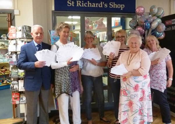 Some of the Friends of Chichester Hospitals volunteers outside its shop in St Richard's