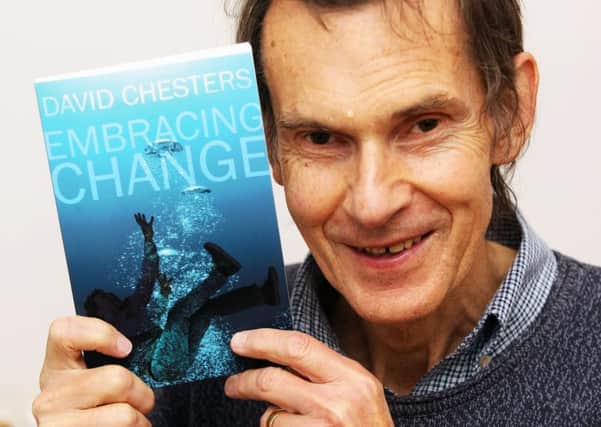 David Chesters with his new book Embracing Change. Picture: Derek Martin DM16154912a