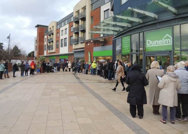 Queues outside the new Dunelm store in The Forum, Horsham SUS-161122-094758001