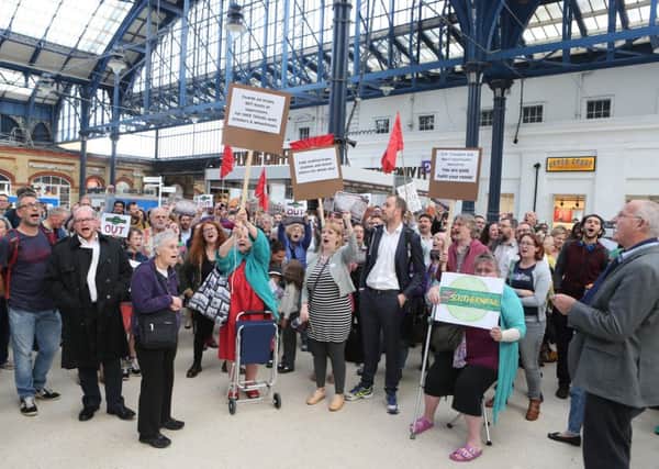A demonstration by passengers at Brighton Station last year. Picture Eddie Mitchell