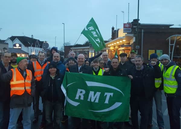 Members of the RMT union outside Horsham Railway Station (photo by the RMT). SUS-161123-093128001