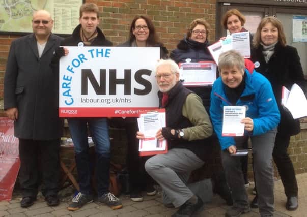 Labour Party members set up stall in Steyning to gain support from shoppers to ask the government to fund the NHS and reduce waiting lists. Picture: Labour South Downs