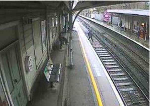Network Rail has released images of a person on the tracks at Burgess Hill