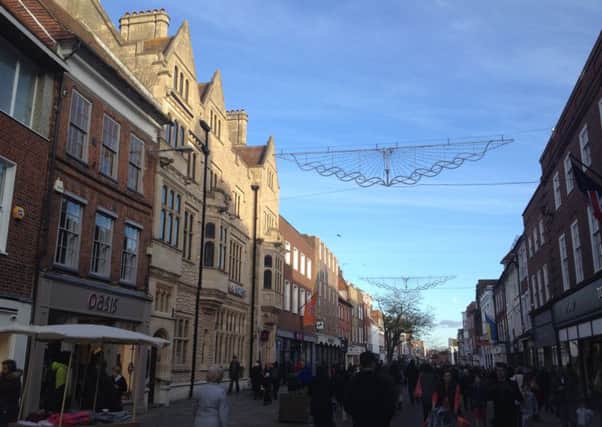 Christmas lights damaged by high winds in East Street, Chichester SUS-151121-171515001