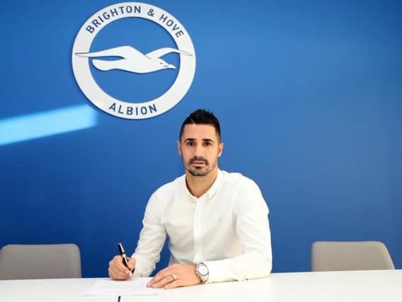 Beram Kayal signs his new contract with Brighton.