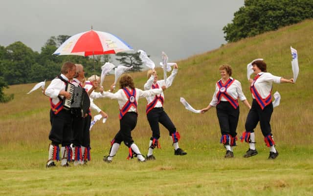 Dancing in Petworth Park - Ditchling Morris perform at the traditiona fete in the park which returns next summer