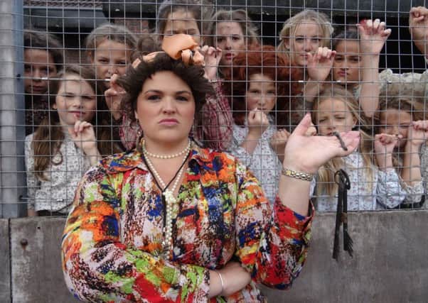 Miss Hannigan with the orphans. Picture by Chris Dale