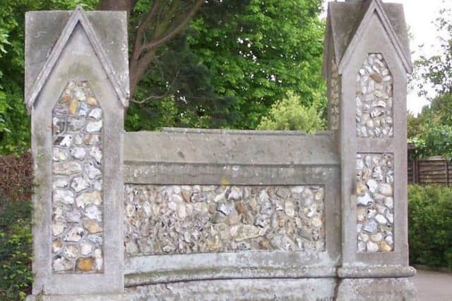 The entrance to the cemetery which contains stone which may have come from the beach