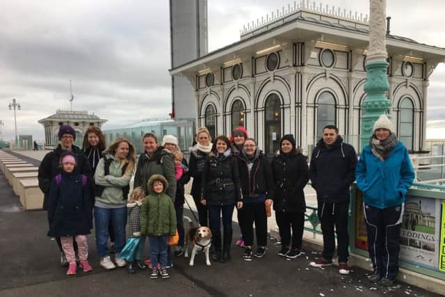 Josie Wilton organised a charity walk from Brighton's i360 to Worthing Pier to raise money for her two-year-old nephew Freddie Oliver, who has a rare undiagnosed condition