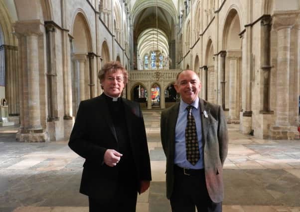 Lord Bourne, Parliamentary Under-Secretary of State for the Department of Communities and Local Government, with Dean of Chichester, the Very Rev. Stephen Waite.