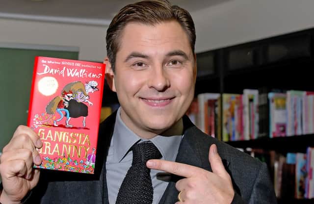 David Walliams with his book Gangsta Granny, which has since been adapted for stage and a BBC film