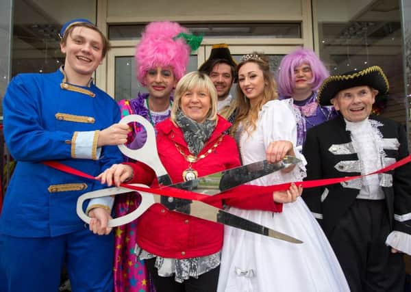 Ciaran McCrickard / Mindworks - Christmas in Rustington town centre last year - Panto characters parade around the town and open the Christmas Grotto with Chair of the Parish Council Alison Cooper (red jacket)