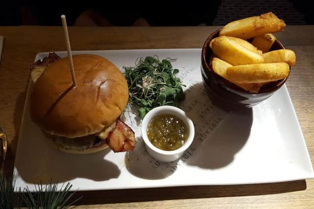 7oz British beef burger in a brioche bun with smoked cheddar, ginger beer glazed thick-cut streaky bacon and triple-cooked chips