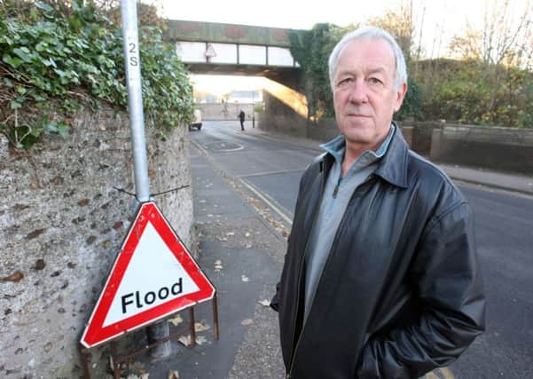 Will Flewett at the junction of Southdown Road and Western Road where the road floods regularly