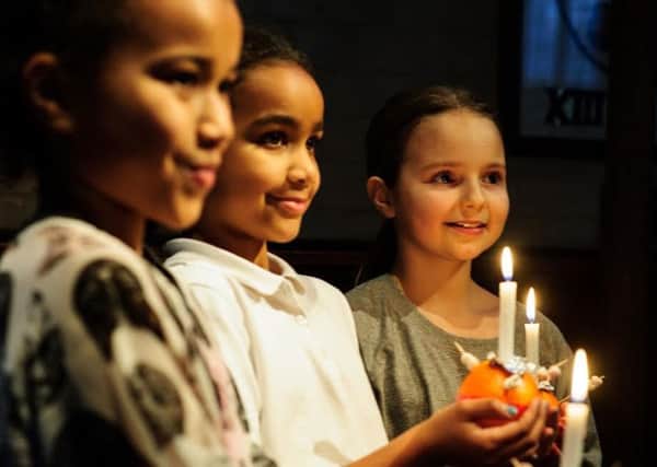 Children celebrate Christingle