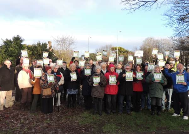 Residents gathered last year to oppose the Offington land sale