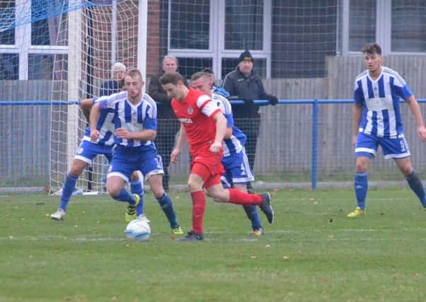 Horsham YMCA's Dave Brown in action against Haywards Heath on Saturday. Picture by Grahame Lehkyj