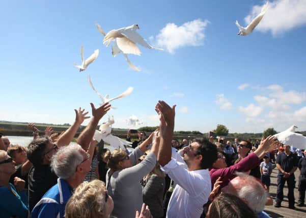 11 doves were released at the Shoreham airshow disaster first anniversary memorial event