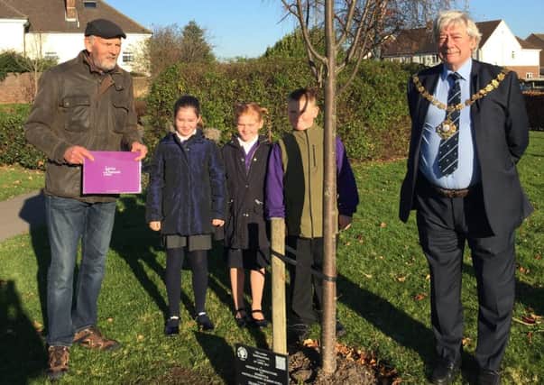 Tree warden Geoff King, left, and Portfield Primary Academy pupils Jessica Currie, Rose Webb and Cameron Webb with Chichester mayor Peter Budge