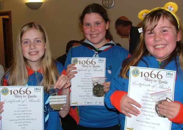 Laura Standen, Abigail Kerr, and  Chanelle Elvery of the 14th St Leonards Guides with their certificates. SUS-160612-112934001