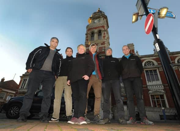 The team from West End which puts the Neon Noel light spectacular together is pictured outside Eastbourne Town Hall