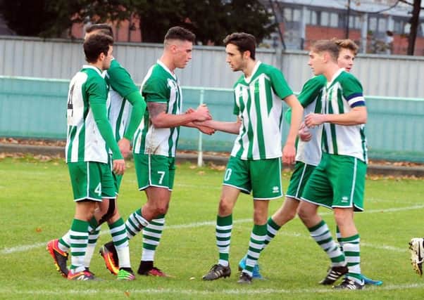 Chichester City celebrate a goal against Hailsham - and they were doing so again at Newhaven / Picture by Kate Shemilt