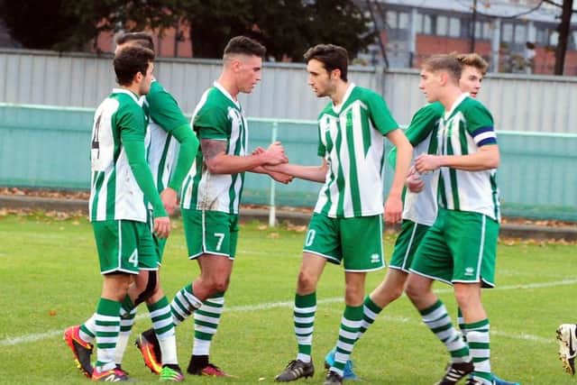 Chichester City celebrate a goal against Hailsham - and they were doing so again at Newhaven / Picture by Kate Shemilt