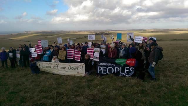 Campaigners assembled on Beachy Head to protest the South Downs sale SUS-160512-120416001