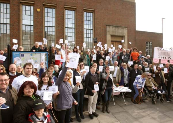 A mass protest staged outside Chichester Combined Court earlier this year